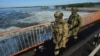  Російські військові на автомобільному мосту біля Каховської ГЕС, 20 травня 2022 року, ілюстраційне фото